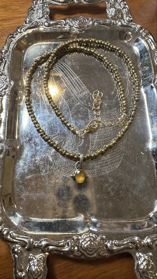 Yellow birthstone pendant Silver 925 (Category: Charms) located in Tagaytay City. Submitted by nixsscloset (Listing ID 1451239553, Image 2). Description: Estate jewelry- Small, oval shaped, faceted, yellow/yellow-orange birthstone pendant set on 925 silver .. comes with a beaded necklace (gold tone hardware).
