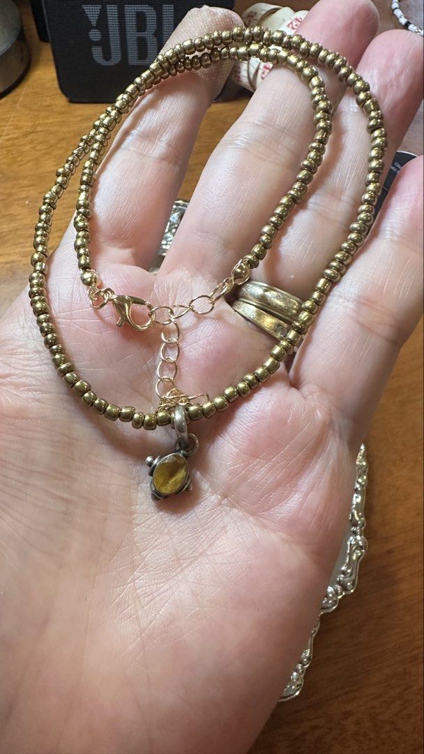 Yellow birthstone pendant Silver 925 (Category: Charms) located in Tagaytay City. Submitted by nixsscloset (Listing ID 1451239553, Image 3). Description: Estate jewelry- Small, oval shaped, faceted, yellow/yellow-orange birthstone pendant set on 925 silver .. comes with a beaded necklace (gold tone hardware).