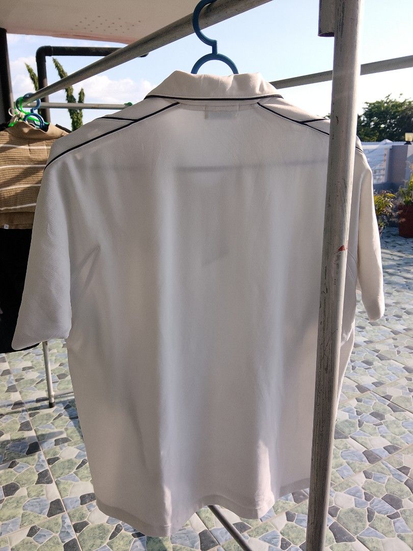 Yonex White Polo (Category: Activewear) located in Manila. Submitted by gentryclothing (Listing ID 1451240309, Image 3). Description: 22x26.5 No Issue Need wash Auth Yonex w hologram tag.