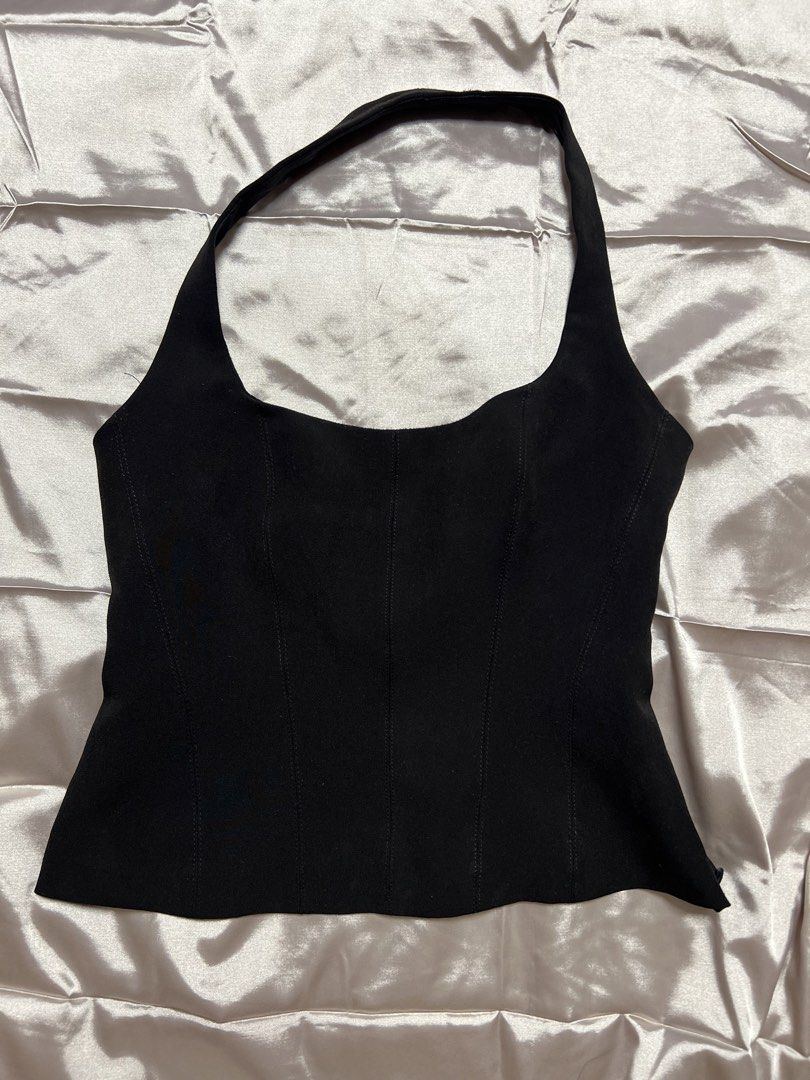 Zara Black Halter Neck Top (Category: Sleeveless) located in Quezon City. Submitted by declutterwithrei (Listing ID 1451288840, Image 1). Description: Zara black halter neck corset top, size XS. Versatile for summer, parties, or casual wear. Best fits 32-34A bust and 23-27 waist. ❗️Also available in white, same size.