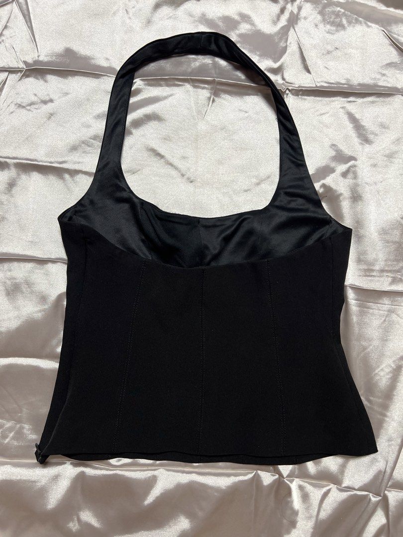 Zara Black Halter Neck Top (Category: Sleeveless) located in Quezon City. Submitted by declutterwithrei (Listing ID 1451288840, Image 3). Description: Zara black halter neck corset top, size XS. Versatile for summer, parties, or casual wear. Best fits 32-34A bust and 23-27 waist. ❗️Also available in white, same size.