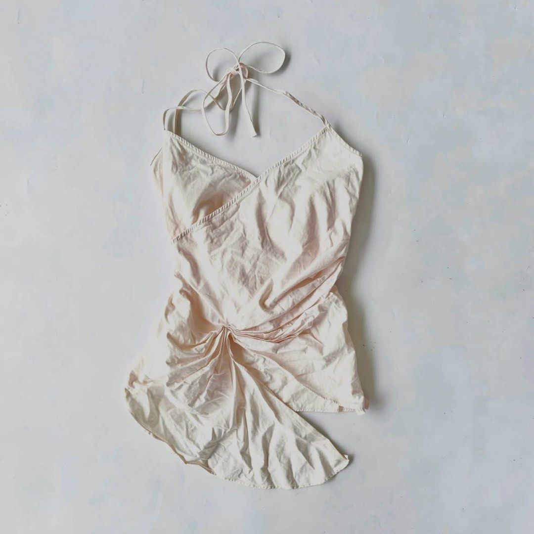 Zara Cream Halter Asymmetrical Tie Top (Category: Others Tops) located in Quezon City. Submitted by danalou (Listing ID 1451232123, Image 1). Description: - size S on tag - more cream than white - like new quality .