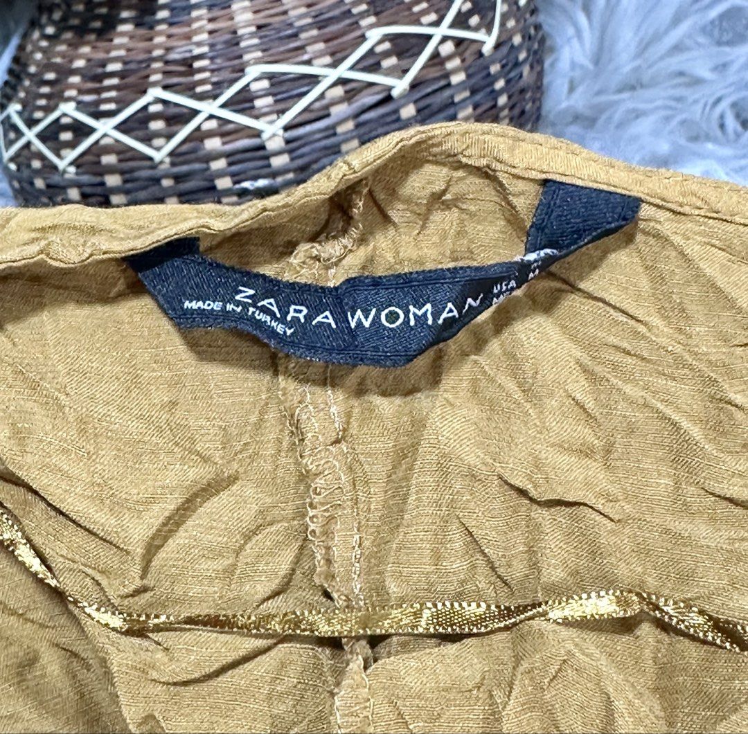 Zara Knotted V Neck Sleeveless Top (Category: Blouses) located in Tarlac. Submitted by ej202177 (Listing ID 1451322833, Image 3). Description: Size Medium Like new Zara for casual/formal Location: Tarlac .