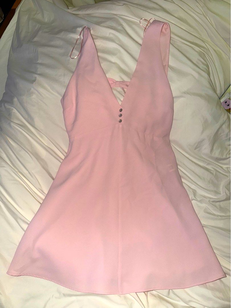 ZARA Pink Dress (Large) (Category: Dresses) located in Paranaque City. Submitted by sandradf (Listing ID 1451251800, Image 2). Description: - Cute pink mini dress from ZARA - V-neck front with a tie-back detail - Small diamond buttons down the front bodice - Perfect for a night out or special occasion - Size Large - Brand new, never worn Bought for: 2,595 Selling for: 1,500.