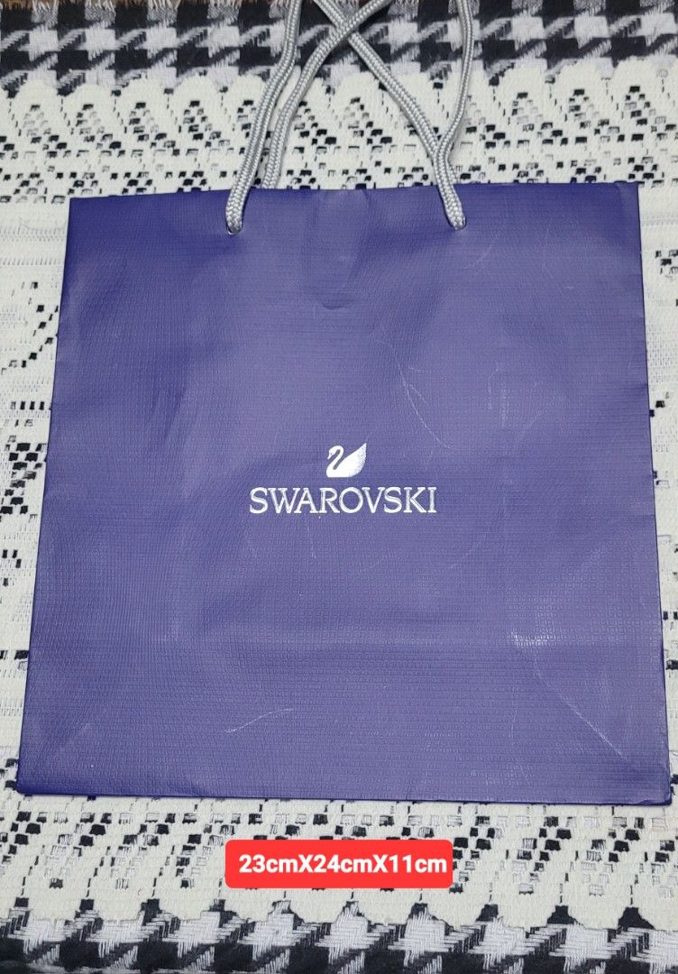 100%Authentic SWAROVSKI paper bag (Category: Luxury Bags & Wallets) located in Manila. Submitted by jthexyz65 (Listing ID 1451452572, Image 1). Description: 100%Authentic Swarovski paper bag,what u see is what u get..