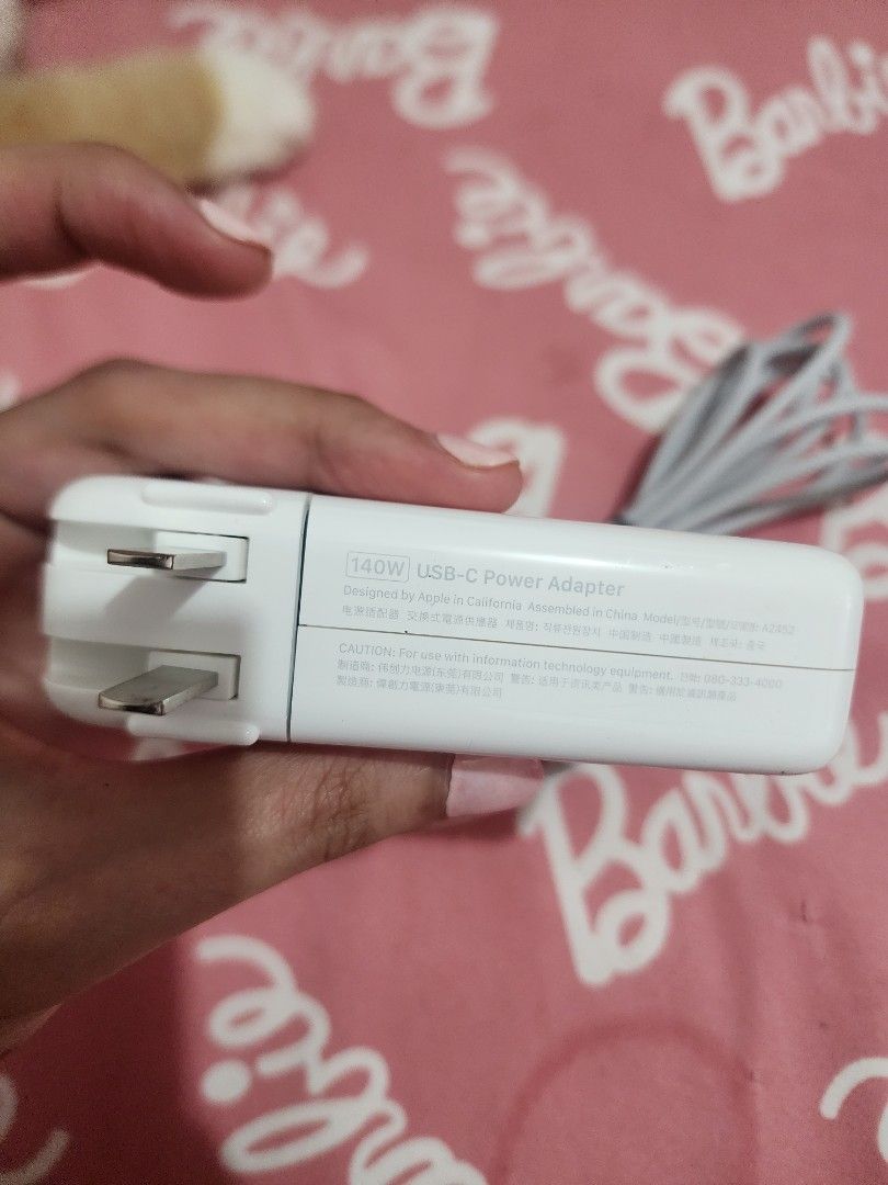 140W USB-C Macbook pro power adapter (Category: Chargers) located in Bacoor. Submitted by panikkiiigadgets (Listing ID 1451462989, Image 2). Description: - 140W USB-C Power Adapter - Compatible with MacBook Pro - Ensures fast and efficient charging - Original - Included in Macbook Pro - RFS - Extra. Company provided me new macbook pro with this charger included but didn't ask to return the old (charger) one. .