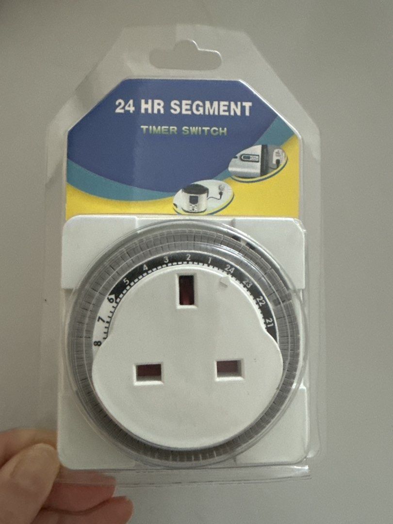 24 HR Segment Timer Switch Plug (Category: Electrical, Adaptors & Sockets) located in Singapore. Submitted by khpf00 (Listing ID 1451362198, Image 1). Description: - Control appliance on/off times with a 24-hour schedule. - Easy setup: just push down pins for desired times. - Compact design fits easily. - Ideal for automating lights, fans, and other electrical devices..