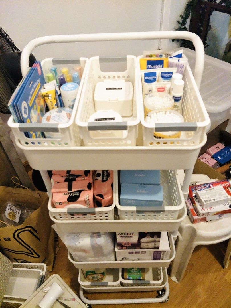 4 Layers Trolley Cart Organizer (Category: Storage Boxes & Baskets) located in Manila. Submitted by erosegee (Listing ID 1451487677, Image 2). Description: 4 Layers Trolley Cart Organizer - Original price: P1,259 - 114 x 42 x 36 cm - White in color - With wheels - Complete set - Metal po ang poles, not plastic - Pinaglagyan po ito ng mga gamit noon ni Baby - Slightly negotiable Heads up! - Di po kasama ang mga mini baskets po, for reference lang 