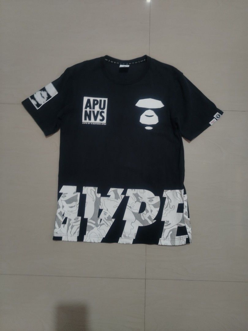 AAPE T-Shirt (Category: Tshirts & Polo Shirts ) located in Tanza. Submitted by reddererd (Listing ID 1451362574, Image 1). Description: Width: 18 Length: 27 Color Rate: 7 Condition: 8 Issues: Fade, Cracked Prints, Hairline 📌This item is thrifted and/or personally used, so please manage your expectations Mode of Payment: G Cash Mode of Delivery: J&T.