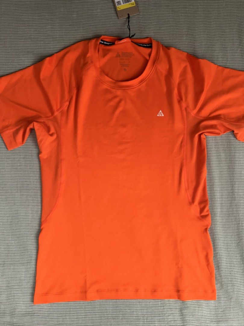 ACG Nike Dri-fit Compression Short Sleeve Shirt (Category: Activewear) located in Muntinlupa City. Submitted by coolthrifto (Listing ID 1451393881, Image 1). Description: Size: small Length: 25.5 Width: 19-20 stretchable pa since dri-fit Issue: none Brand new with tag authentic Can authenticate with tag Complete everything.