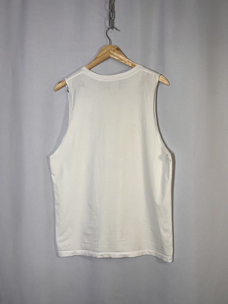 Adidas Essentials Small Logo Single Jersey Tank Top (White) (Category: Activewear) located in Manila. Submitted by randsclothingstore (Listing ID 1451327997, Image 2). Description: BRAND: Adidas Size (Inch) ‼️Medida Size‼️ : W 21 | L 28 Color Rate: 9/10 Condition: Like New Issue: Loose stitching on neck line, fine lints, not so white and needs bleaching ‼️ Thrifted item — please manage your expectations, authenticity is not guaranteed (check phot