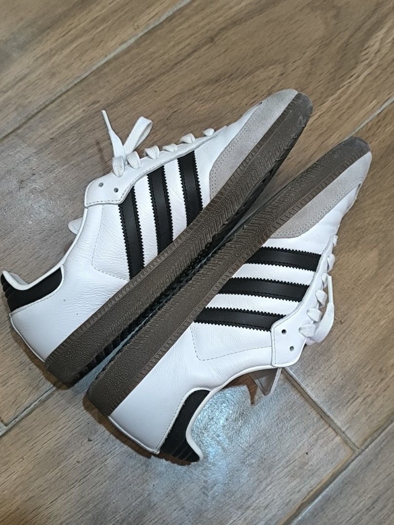 Adidas Samba OG White Black Gum Sole (Category: Sneakers) located in Manila. Submitted by tippytottie (Listing ID 1451421947, Image 3). Description: - Classic Adidas Samba OG sneakers - White leather with iconic black stripes - Durable gum sole - Shows minor signs of wear on sole and toe box - Size 9.5 - Plenty of life left for everyday wear.