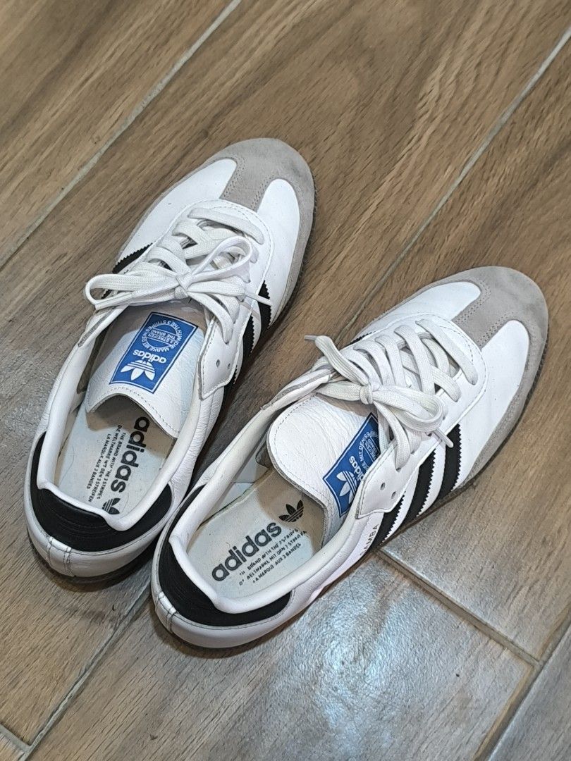 Adidas Samba OG White Black Gum Sole (Category: Sneakers) located in Manila. Submitted by tippytottie (Listing ID 1451421947, Image 1). Description: - Classic Adidas Samba OG sneakers - White leather with iconic black stripes - Durable gum sole - Shows minor signs of wear on sole and toe box - Size 9.5 - Plenty of life left for everyday wear.