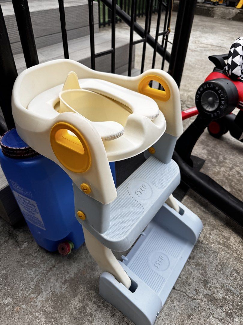 Adjustable Toddler Potty Training Seat with Steps (Category: Toilet Training) located in Dinalupihan. Submitted by cheysildlrs96 (Listing ID 1451332789, Image 2). Description: - Adjustable seat for growing toddlers - Sturdy steps for safe climbing - Comfortable design with supportive handles - Easy to clean and assemble - Promotes independence during potty training.
