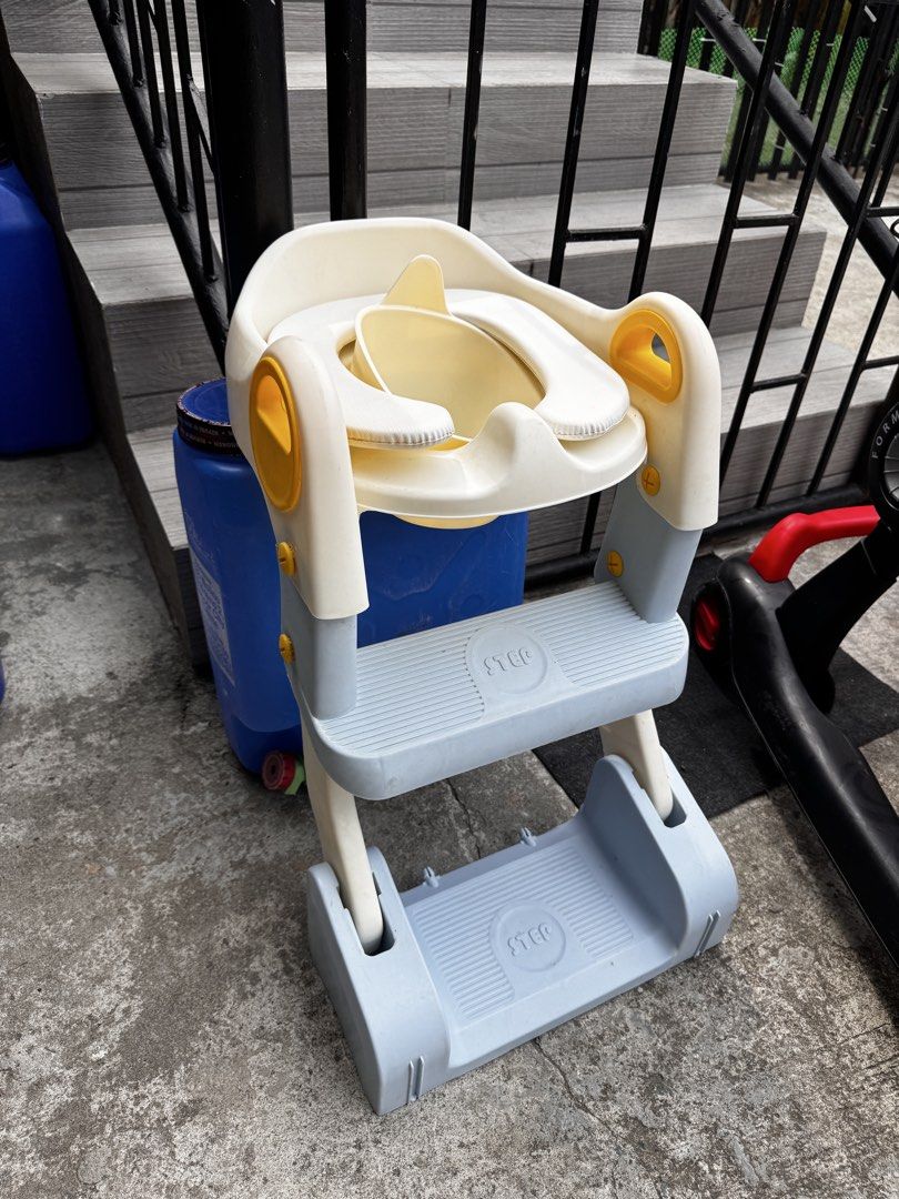 Adjustable Toddler Potty Training Seat with Steps (Category: Toilet Training) located in Dinalupihan. Submitted by cheysildlrs96 (Listing ID 1451332789, Image 1). Description: - Adjustable seat for growing toddlers - Sturdy steps for safe climbing - Comfortable design with supportive handles - Easy to clean and assemble - Promotes independence during potty training.