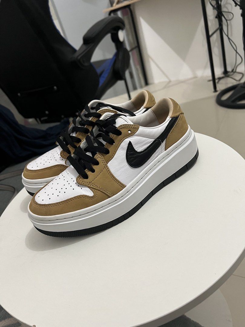 Air Jordan 1 Low SE "Light Olive" (Category: Shoe inserts) located in Manila. Submitted by shylento (Listing ID 1451402281, Image 3). Description: - Classic Air Jordan 1 Low SE - Clean white and light olive colorway - Features iconic silhouette - Platform sole for added height and style - Black laces and black swoosh - Ideal for casual wear or making a fashion statement.
