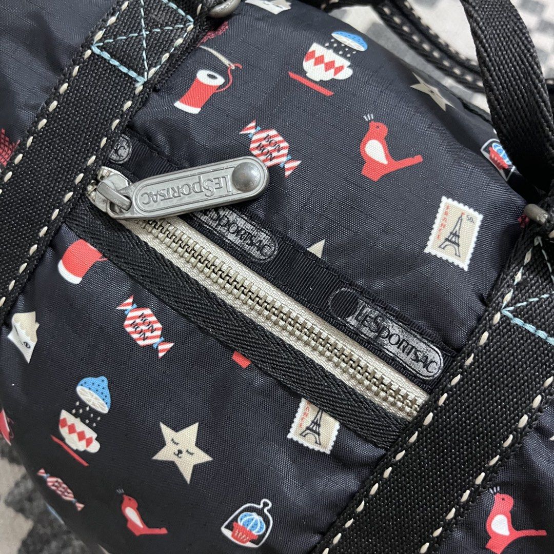 Aut. LeSportSac Sling Tote Bag (Category: Cross-body Bags) located in Tanjong Kling. Submitted by dstore88 (Listing ID 1451489324, Image 3). Description: good used condition 7.5/10 with some minor used effect original item negotiable.