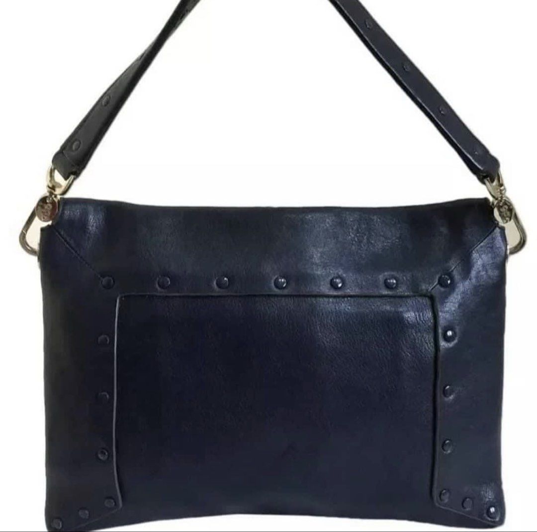 RUSH SALE Authentic Preloved Anya Hindmarch Navy Studded Leather Envelope Bag (Category: Luxury Bags & Wallets) located in Baguio. Submitted by designerbin.ph (Listing ID 1451336105, Image 2). Description: Authentic Preloved Anya Hindmarch Navy Studded Leather Envelope Bag Made in Italy Condition: Navy studded leather envelope shoulder bag by Anya Hindmarch. Features single compartment with interior slip pocket, leather lining, gold tone hardware
