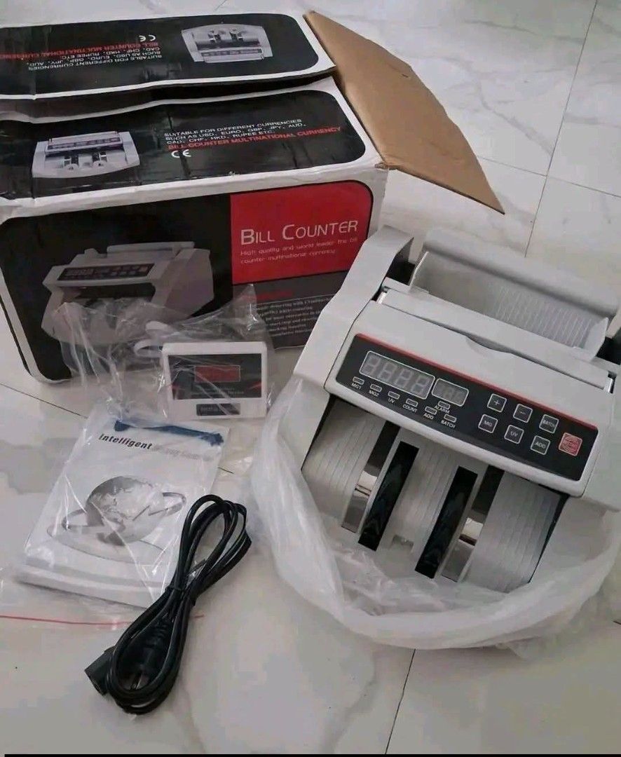 Bill Counter Machine with External Display (Category: Office & Business Technology) located in Caloocan City. Submitted by swiftflower_802790 (Listing ID 1451384404, Image 1). Description: - Multifunctional Bill Counting Machine - Comes with External Display - Includes Power Cord - Original Box Included - Ideal for Businesses - Fast and Efficient Cash Counting - Ready for Immediate Use.