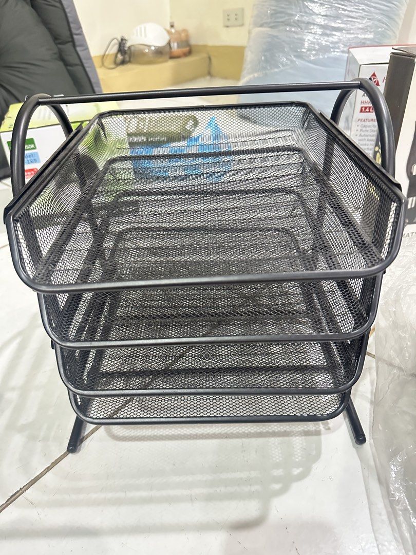 Black 3-Tier Mesh Desk Organizer Tray (Category: Storage Boxes & Baskets) located in Quezon City. Submitted by faststone.ba186f (Listing ID 1451443091, Image 1). Description: - Black mesh desk organizer with 3 tiers - Ideal for sorting mail, documents, and office supplies - Keeps your workspace neat and tidy - Durable metal construction - Trays slide in and out easily - Suitable for both home and office environments.