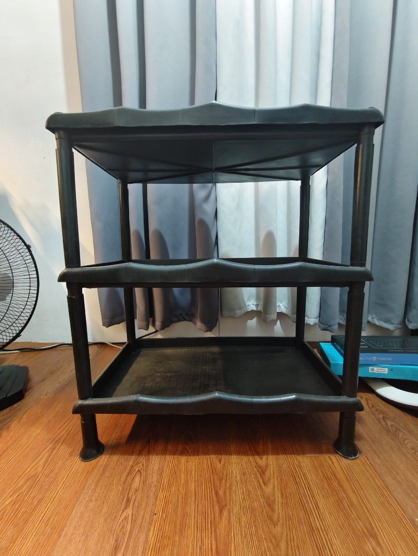 Black organizer, plastic, heavy duty (Category: Storage Boxes & Baskets) located in Bulacan. Submitted by krissydecluttered (Listing ID 1451437545, Image 1). Description: Organizer, patungan ng gamit. perfect for families starting heavy duty. can be used in kitchen, bed room, office used very well and is now just for decluttering for please message me because price is negotiable Color black, plastic.