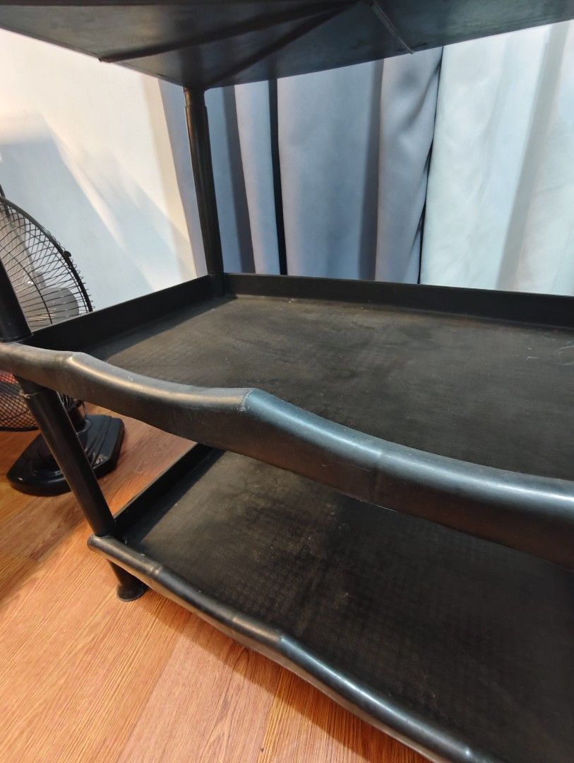 Black organizer, plastic, heavy duty (Category: Storage Boxes & Baskets) located in Bulacan. Submitted by krissydecluttered (Listing ID 1451437545, Image 2). Description: Organizer, patungan ng gamit. perfect for families starting heavy duty. can be used in kitchen, bed room, office used very well and is now just for decluttering for please message me because price is negotiable Color black, plastic.