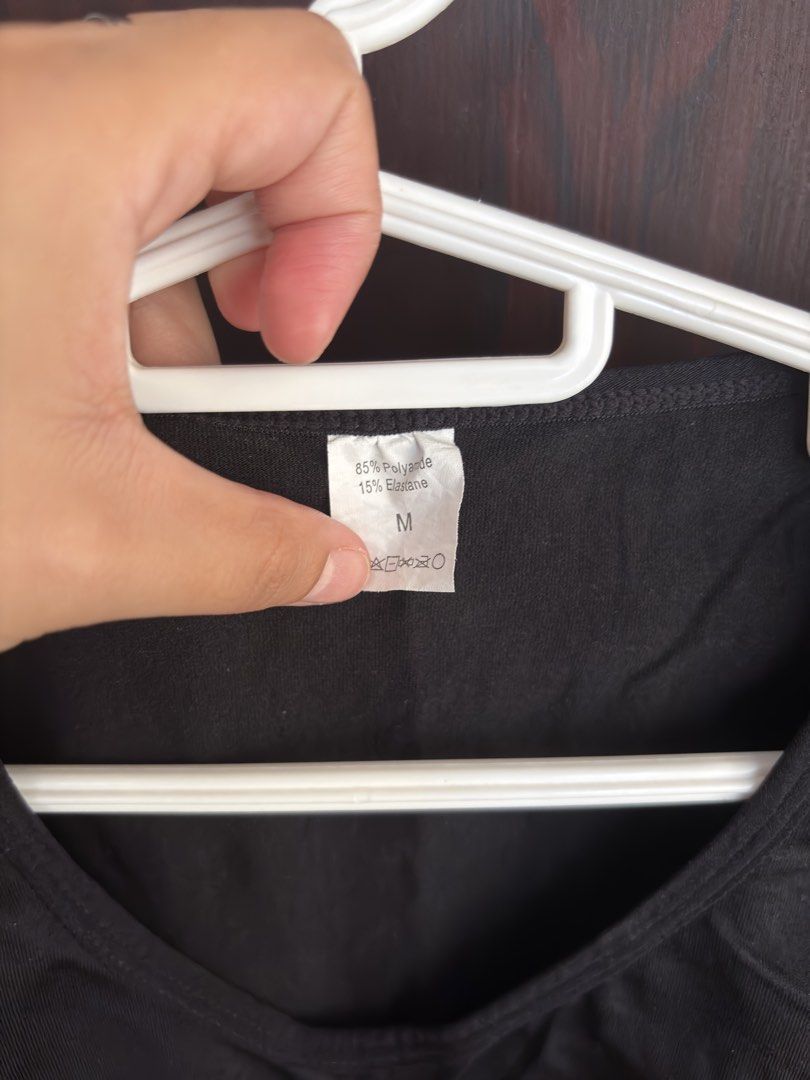 Black Short Sleeve Shapewear Bodysuit Size M (Category: Undergarments & Loungewear) located in Calamba. Submitted by gie_24 (Listing ID 1451367573, Image 2). Description: - Black short sleeve bodysuit - Deep V-neckline - Built-in bra cups for support - Stretchy polyamide and elastane blend - Smooths and shapes under clothing - Comfortable for all-day wear.