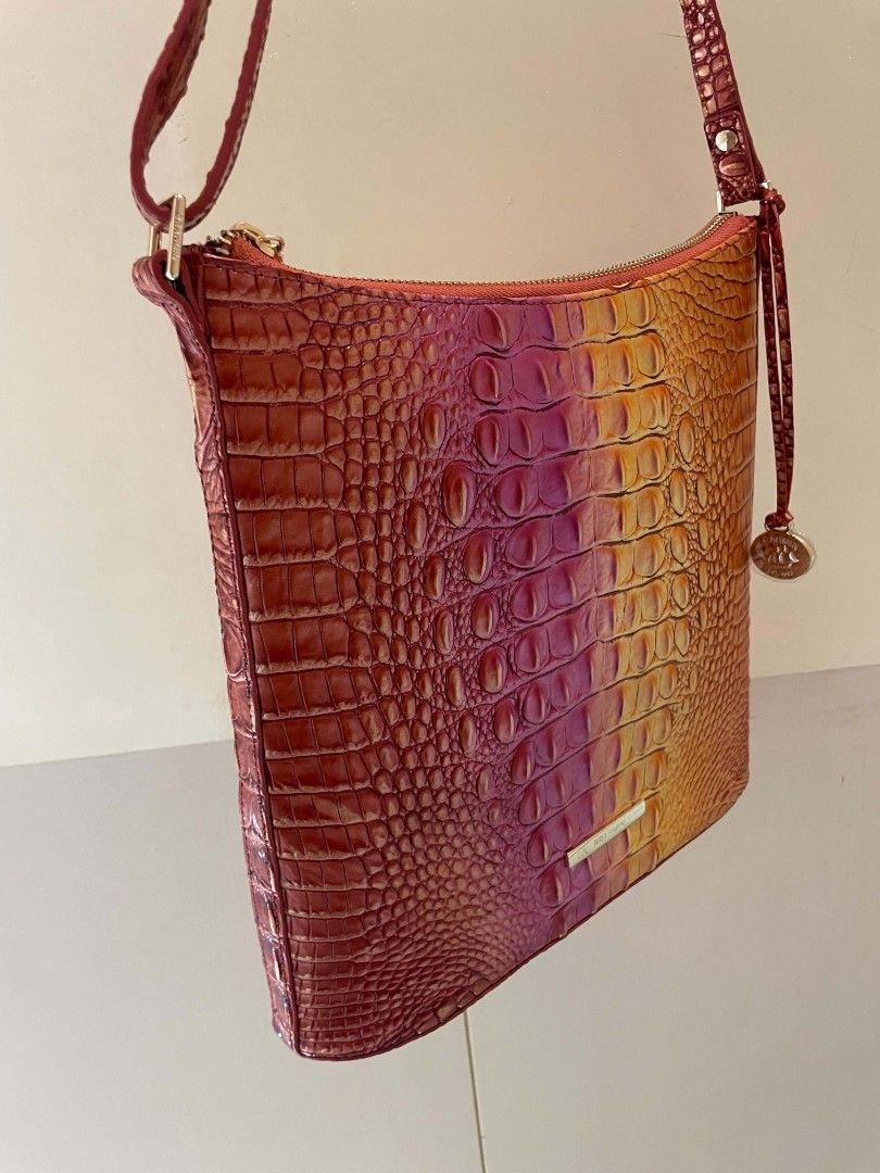 Brahmin Ombre Croc Embossed Leather Shoulder Bag (Category: Luxury Bags & Wallets) located in Plaridel. Submitted by collectors_blocc (Listing ID 1451468094, Image 2). Description: - Beautiful Brahmin shoulder bag - Stunning ombre effect with croc-embossed leather - Colors transition from pink to orange and yellow - Secure zipper closure - Interior pockets for organization - Adjustable strap for comfortable wear - Versatile for everyday use or a 