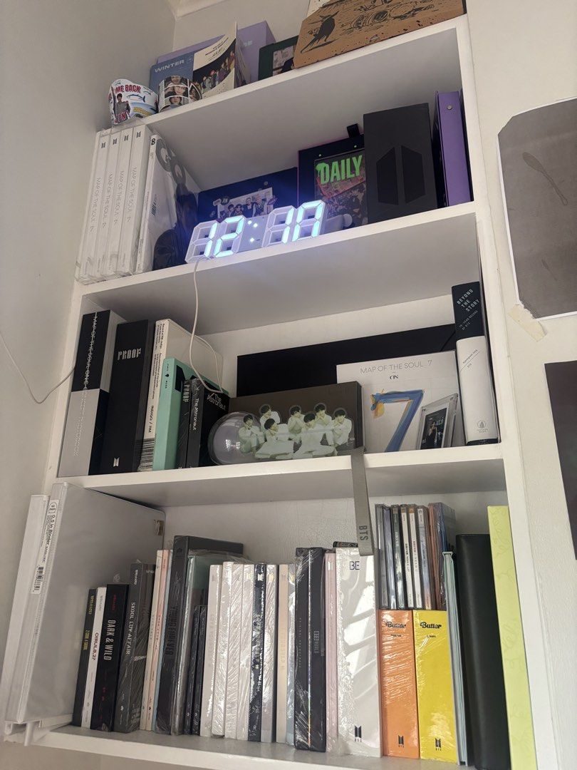 BTS Albums and Merchandise Collection (Category: K-Wave Merchandise) located in Rizal. Submitted by boomidum (Listing ID 1451358622, Image 1). Description: take all with photocards for 25k with army bomb, korean albums, japanese cds, incomplete winter package, 2015 summer package, gq magazine, mots photobook, dicon photocards.