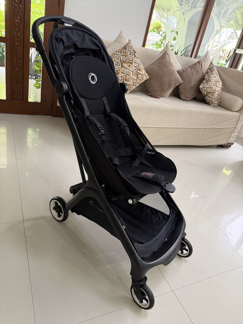 Bugaboo Butterfly (Category: Strollers) located in Quezon City. Submitted by tiffanysiobe (Listing ID 1451334616, Image 2). Description: - Lightweight and easy to maneuver black compact stroller - Offers good sun protection with its canopy - Convenient storage basket underneath - Folds down easily for travel and storage - Ideal for everyday use and family trips With brand new rain cover. .