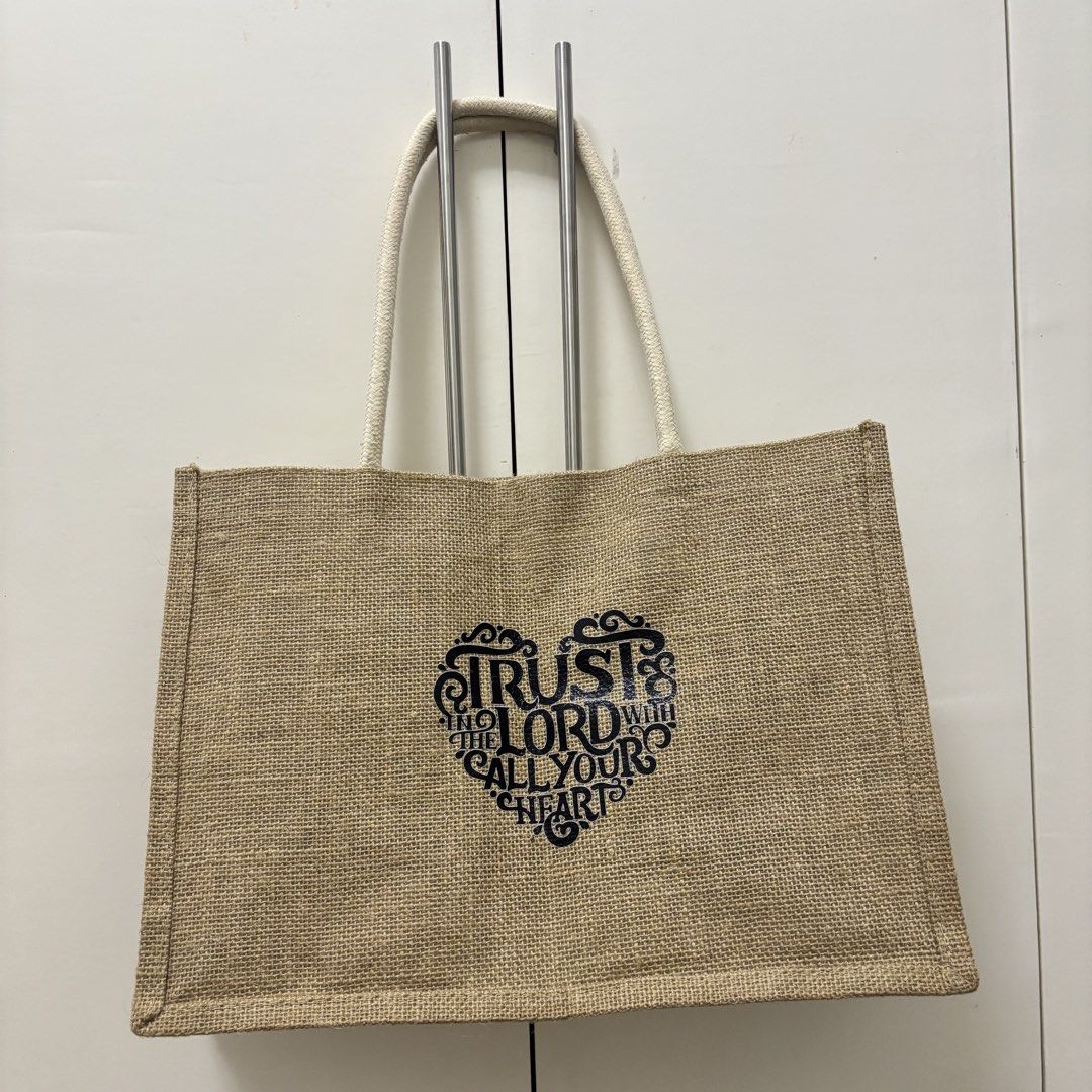 burlap bag (Category: Shoulder Bags) located in Manila. Submitted by lavieelle (Listing ID 1451463718, Image 1). Description: - eco friendly jute tote bag - with black bible print in front - spacious, can be used as every day bag - rfs: decluttering .