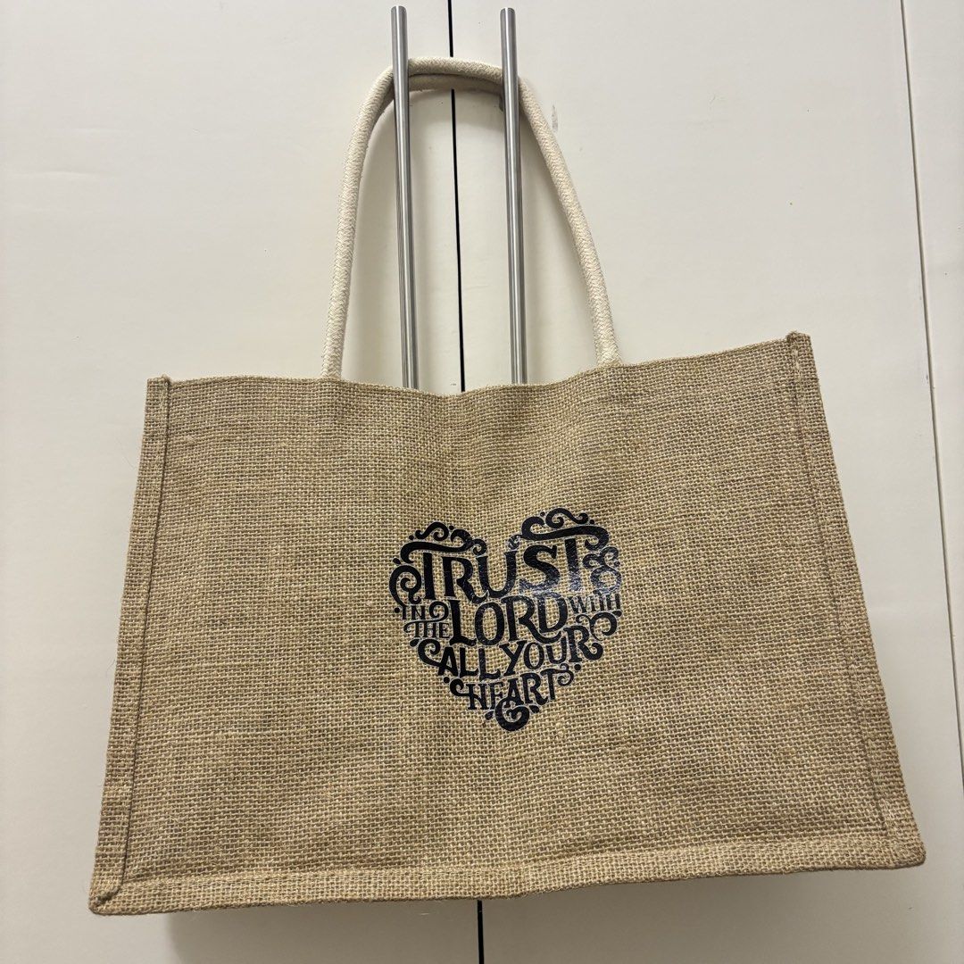 burlap bag (Category: Shoulder Bags) located in Manila. Submitted by lavieelle (Listing ID 1451463718, Image 2). Description: - eco friendly jute tote bag - with black bible print in front - spacious, can be used as every day bag - rfs: decluttering .