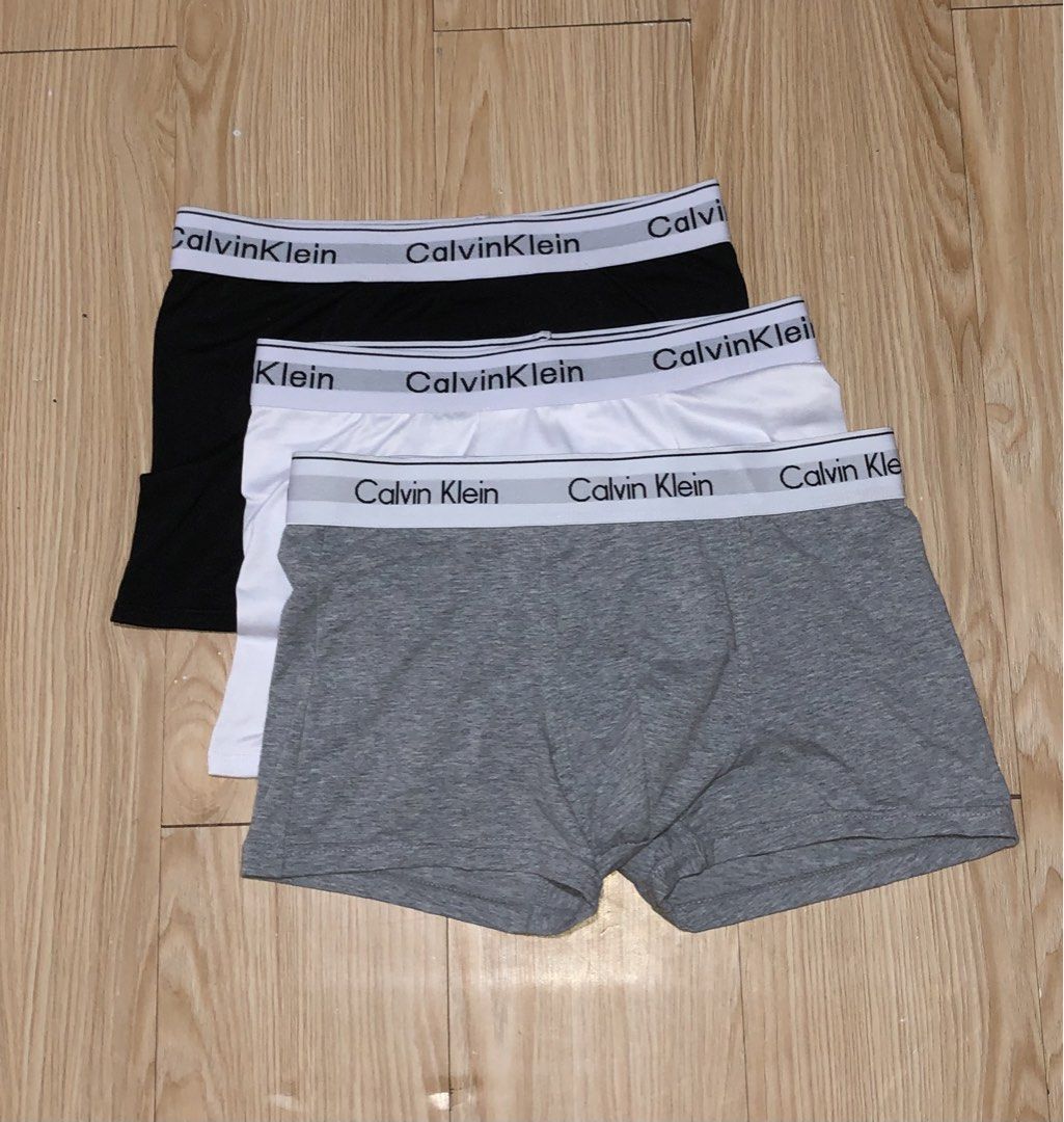 Calvin Klein Boxer Briefs (Category: Underwear) located in Manila. Submitted by grandfire-d26d (Listing ID 1451442764, Image 1). Description: - Three pairs of Calvin Klein boxer briefs - Includes one black, one white, and one grey pair - Features the iconic Calvin Klein waistband - Designed for comfort and style - Perfect for everyday wear.