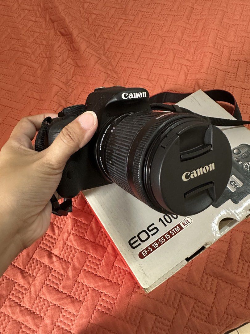 Canon EOS 100D EF-S 18-55 IS STM Kit DSLR Camera (Category: Cameras) located in Manila. Submitted by ericayoo (Listing ID 1451516726, Image 1). Description: - Canon EOS 100D DSLR camera - EF-S 18-55mm IS STM kit lens included - Original box and manuals included - Ideal for beginners and enthusiasts - Easy to handle and operate - Capture your moments with this reliable Canon camera.