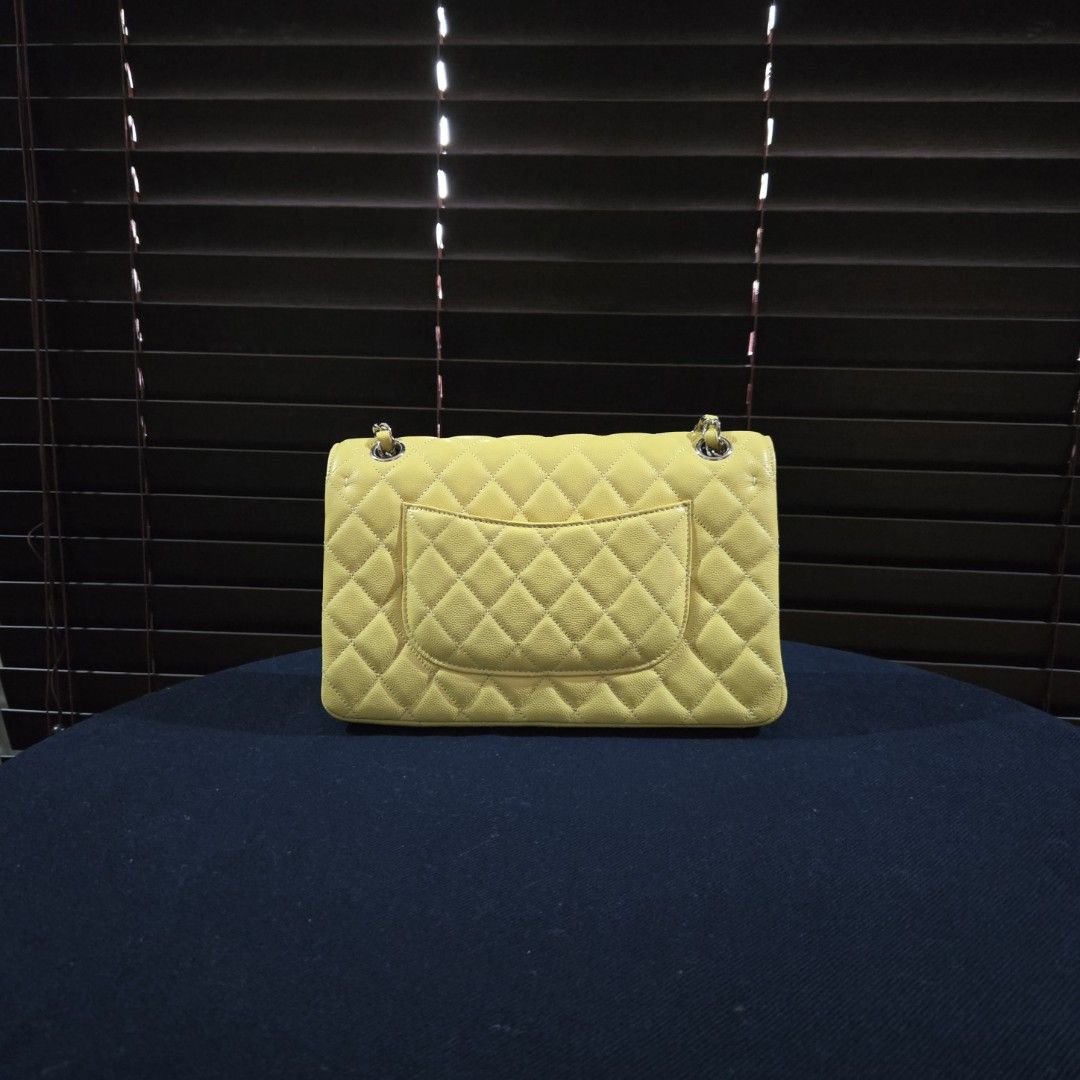 Cc Double Flap (Category: Luxury Bags & Wallets) located in Paranaque City. Submitted by dclutterqueen (Listing ID 1451330161, Image 2). Description: Chanel Double Flap in Lemon Yellow color 🍋 💯 Genuine Caviar Quilted Leather 🇯🇵 Acquired preloved from Japan 👜 Measures approximately 9 x 6 inches.