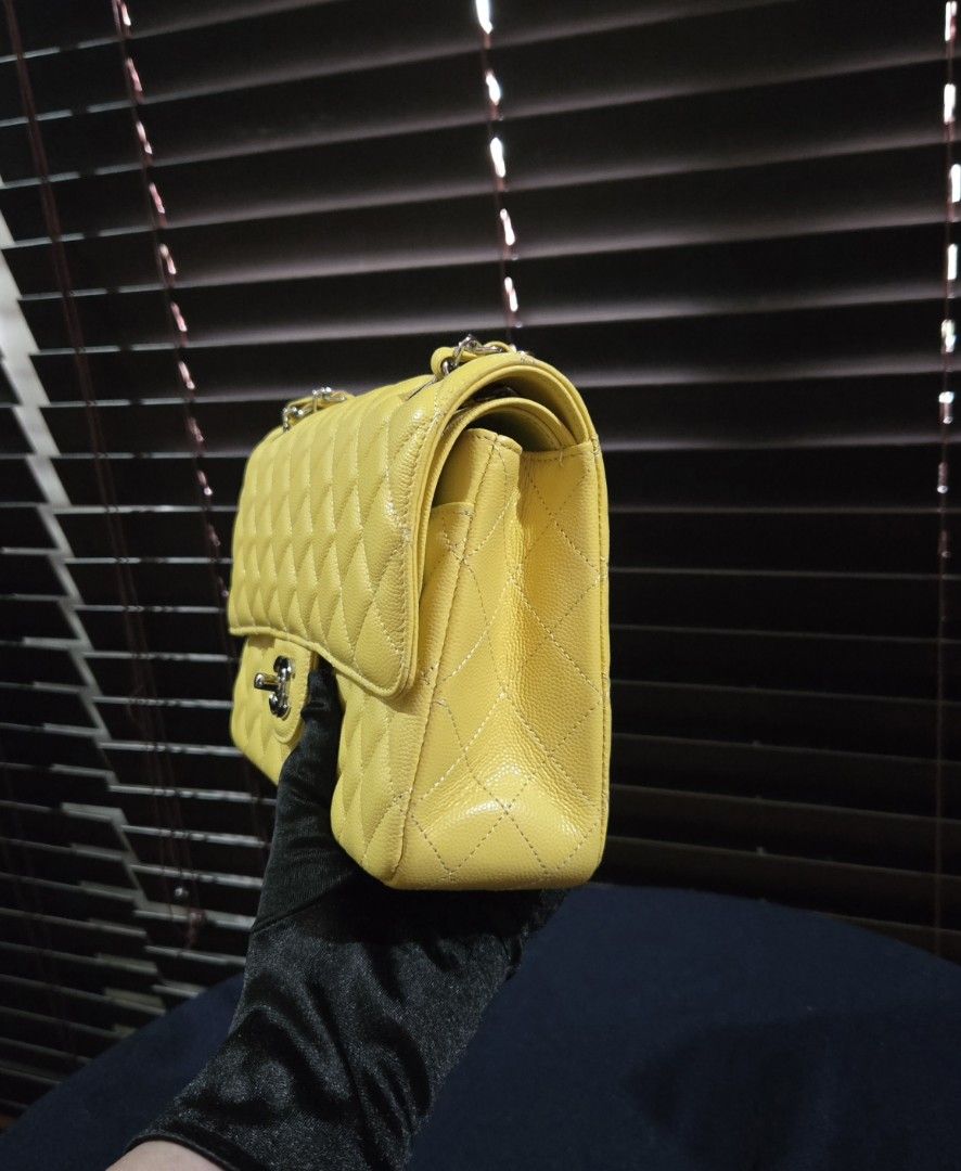 Cc Double Flap (Category: Luxury Bags & Wallets) located in Paranaque City. Submitted by dclutterqueen (Listing ID 1451330161, Image 3). Description: Chanel Double Flap in Lemon Yellow color 🍋 💯 Genuine Caviar Quilted Leather 🇯🇵 Acquired preloved from Japan 👜 Measures approximately 9 x 6 inches.