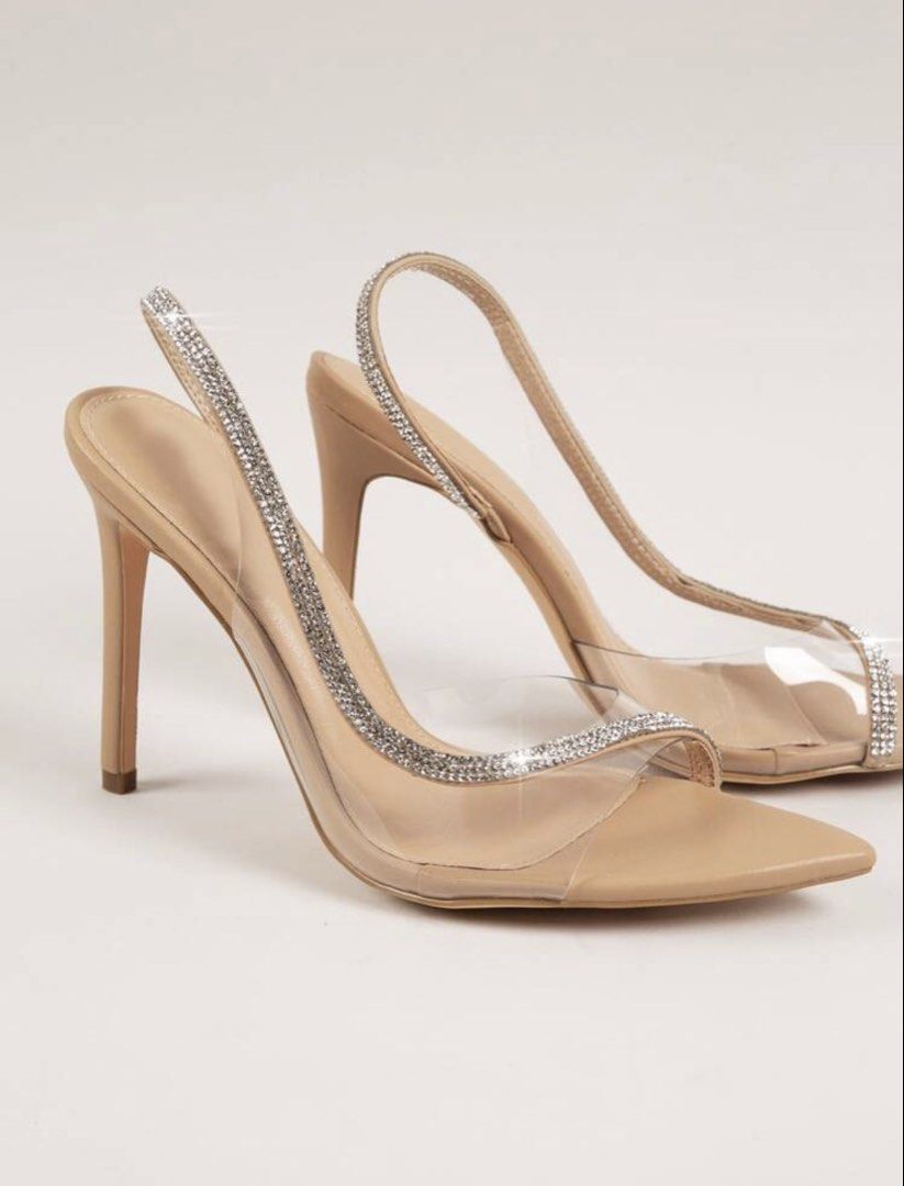 Clear Slingback Heels with Rhinestone Strap (Category: Heels) located in Ampang. Submitted by habibah__abby (Listing ID 1451377093, Image 2). Description: Chic pointed toe slingback heels with clear PVC straps and rhinestone trim. Features an elasticated slingback for comfort and a nude sole/heel. Perfect for parties or nights out!.