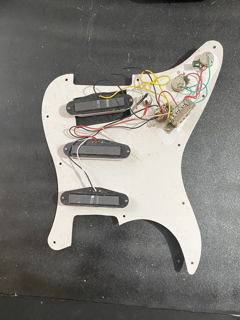 Clifton SSS Pickup Set (Category: Musical Instruments) located in Manila. Submitted by franz.526 (Listing ID 1451413082, Image 2). Description: Pickups from Clifton Stratocaster Electric Guitar Details: • Working Condition, No hum, No Grounded • May naka-abang na killswitch Issue: • May tapyas pickguard pang humbucker • No Volume & Tone Knobs Reason For Sale: Nag upgrade to Humbucker 700 Nego Meetup Near Trece Martires City, Cavite Or Pickup niyo