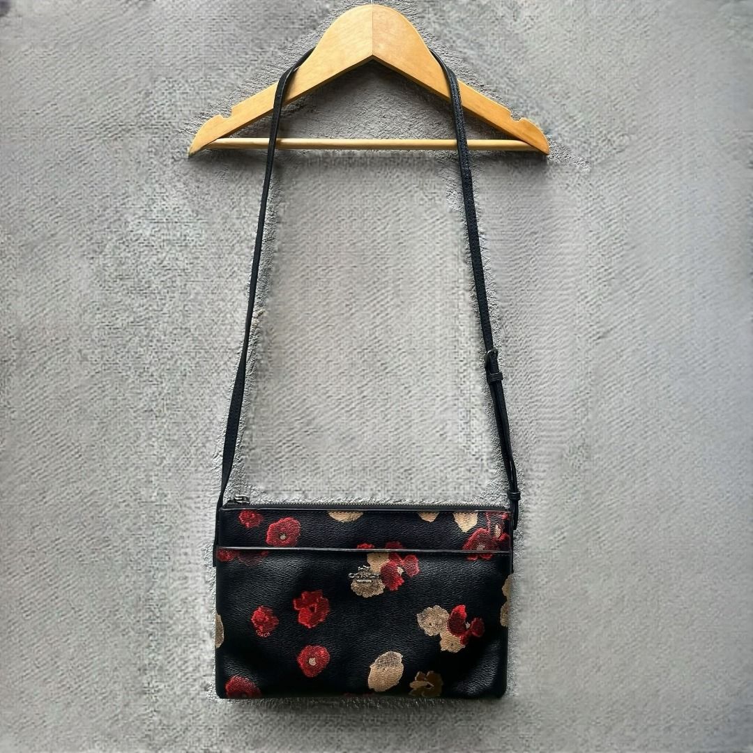 Coach Floral Crossbody Bag (Category: Luxury Bags & Wallets) located in Taytay. Submitted by second_couturecache (Listing ID 1451431460, Image 1). Description: May sign of use, re-attached yung sling, may flaw sa hardware. Kindly self-authenticate! Selling for reasonable price so manage your expectation! First to pay basis and payment first. Other Delivery option shouldered by buyer: Lalamove or J&T. Location: Taytay, Rizal.
