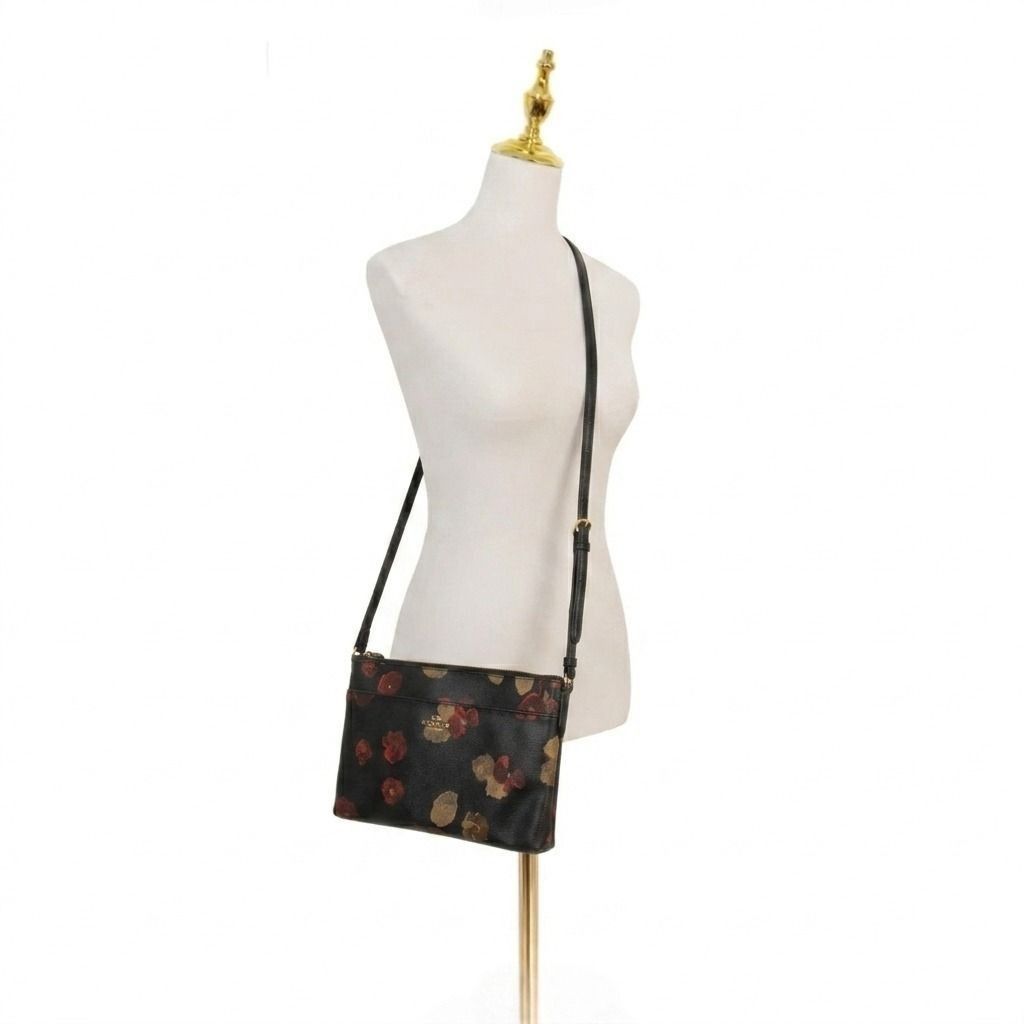 Coach Floral Crossbody Bag (Category: Luxury Bags & Wallets) located in Taytay. Submitted by second_couturecache (Listing ID 1451431460, Image 2). Description: May sign of use, re-attached yung sling, may flaw sa hardware. Kindly self-authenticate! Selling for reasonable price so manage your expectation! First to pay basis and payment first. Other Delivery option shouldered by buyer: Lalamove or J&T. Location: Taytay, Rizal.