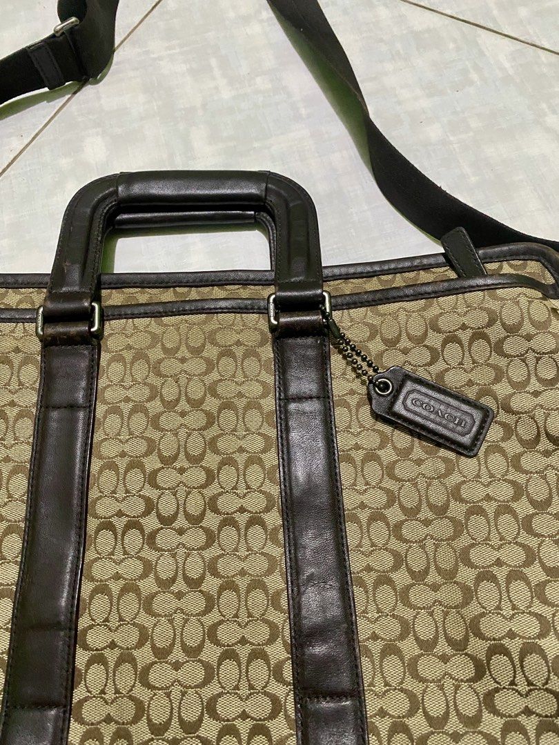 COACH MESSENGER BAG (Category: Briefcases) located in Dagupan City. Submitted by casadebayongph (Listing ID 1451326542, Image 3). Description: - Classic Coach monogram briefcase - Signature tan and brown pattern - Genuine leather trim and handles - Includes detachable shoulder strap - Ample space for work essentials - Ideal for daily use or travel.