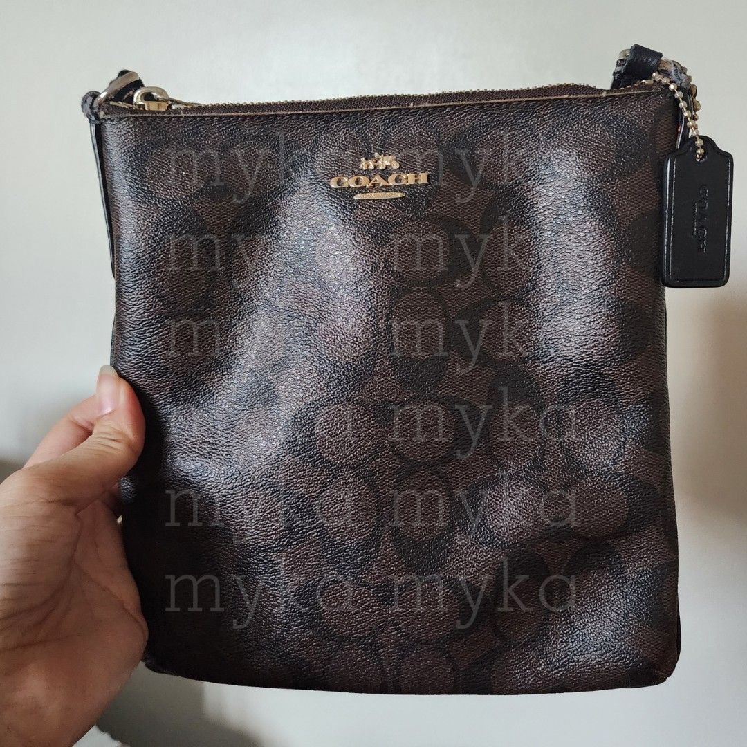 COACH MINI ROWAN CROSSBODY BAG (Category: Luxury Bags & Wallets) located in Mandaluyong City. Submitted by mykaelyn (Listing ID 1408756327, Image 1). Description: Authentic Coach Mini Rowan File Bag Has some signs of use but is very well taken care of :) Price is a bit negotiable RFS: Decluttering :') MEET-UPS in Makati City: Glorietta Greenbelt One Ayala.