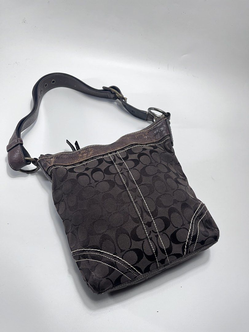Coach Monogram Canvas Leather Trim Shoulder Bag (Category: Luxury Bags & Wallets) located in Iloilo. Submitted by fromthebins.ilo2 (Listing ID 1451417869, Image 1). Description: - Authentic brown Coach monogram canvas shoulder bag - Genuine leather trim and strap - Convenient zippered front pocket - Interior zippered pocket for essentials - Some signs of wear on leather trim and strap - Overall in good, pre-loved condition -details posted Mop;gca