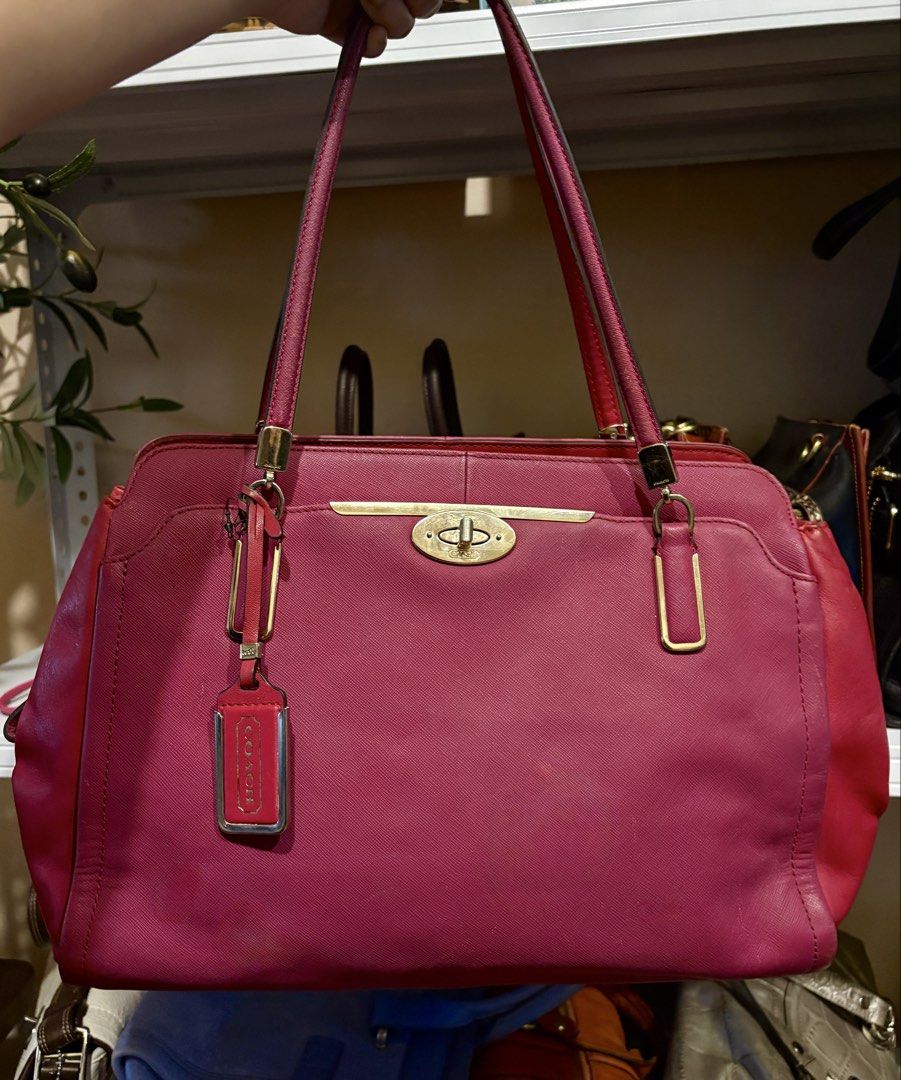 Coach Pink Leather Tote Bag (Category: Luxury Bags & Wallets) located in Manila. Submitted by katrinaalv30472 (Listing ID 1451398762, Image 1). Description: - Authentic Coach Madison Spectator Saffiano Kimberly Carryall - Genuine Leather Material - Elegant Gold Hardware - Spacious Main Compartment - Secure Front Clasp Closure - Comes with Original Coach Hangtag - Ideal Everyday Bag for Your Essentials.