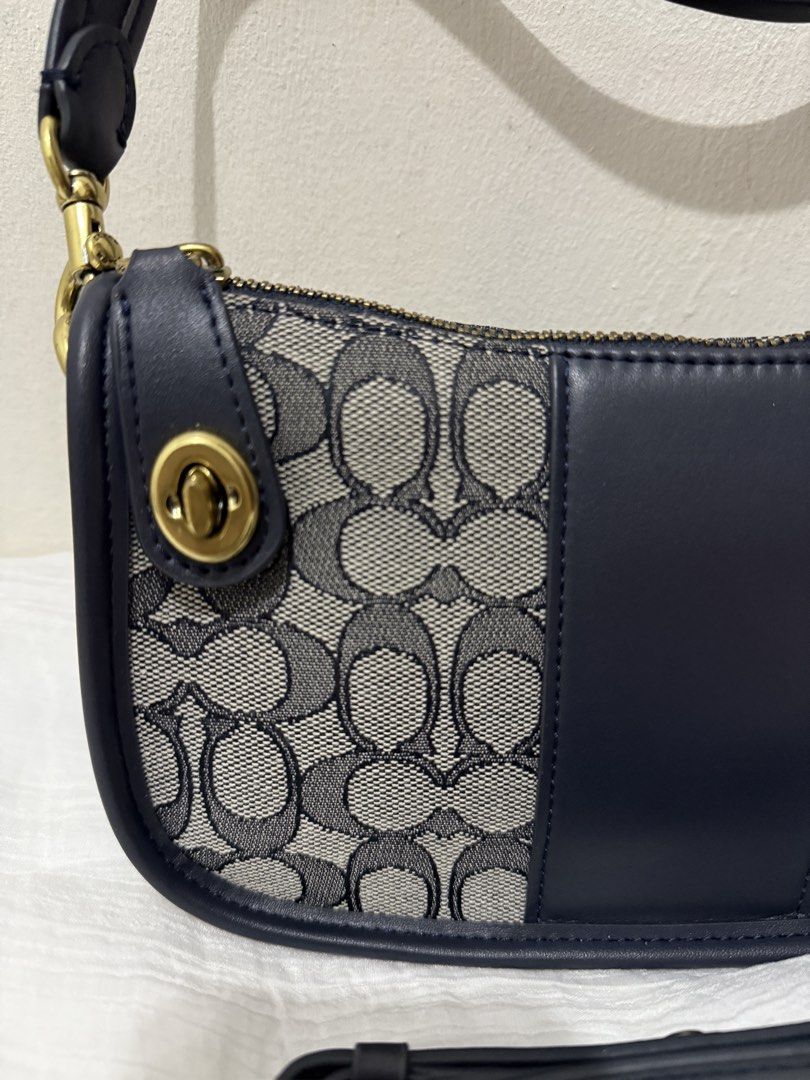 Coach Swinger (Category: Luxury Bags & Wallets) located in Cainta. Submitted by angellyy_ (Listing ID 1451479655, Image 2). Description: Coach Swinger 2way Jacquard Navy Used once - No flaws N.G.A.