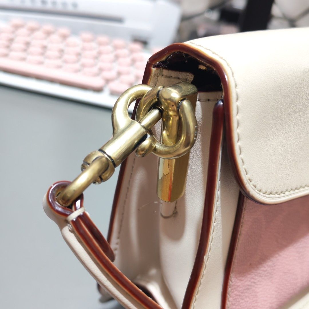 Coach Tabby 26 Shoulder Bag Cream Pink Monogram (Category: Luxury Bags & Wallets) located in Santa Maria. Submitted by riefinds (Listing ID 1451432717, Image 3). Description: - Cream and pink Coach Tabby bag - Classic C monogram print on front - Gold hardware with signature turn-lock closure - Leather trim and strap - Comes with Coach New York tag - Versatile for everyday use or nights out.
