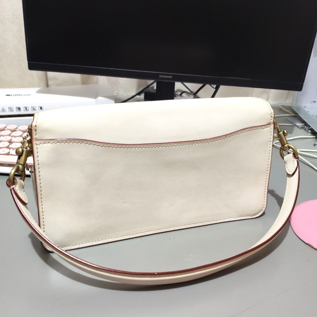 Coach Tabby 26 Shoulder Bag Cream Pink Monogram (Category: Luxury Bags & Wallets) located in Santa Maria. Submitted by riefinds (Listing ID 1451432717, Image 2). Description: - Cream and pink Coach Tabby bag - Classic C monogram print on front - Gold hardware with signature turn-lock closure - Leather trim and strap - Comes with Coach New York tag - Versatile for everyday use or nights out.
