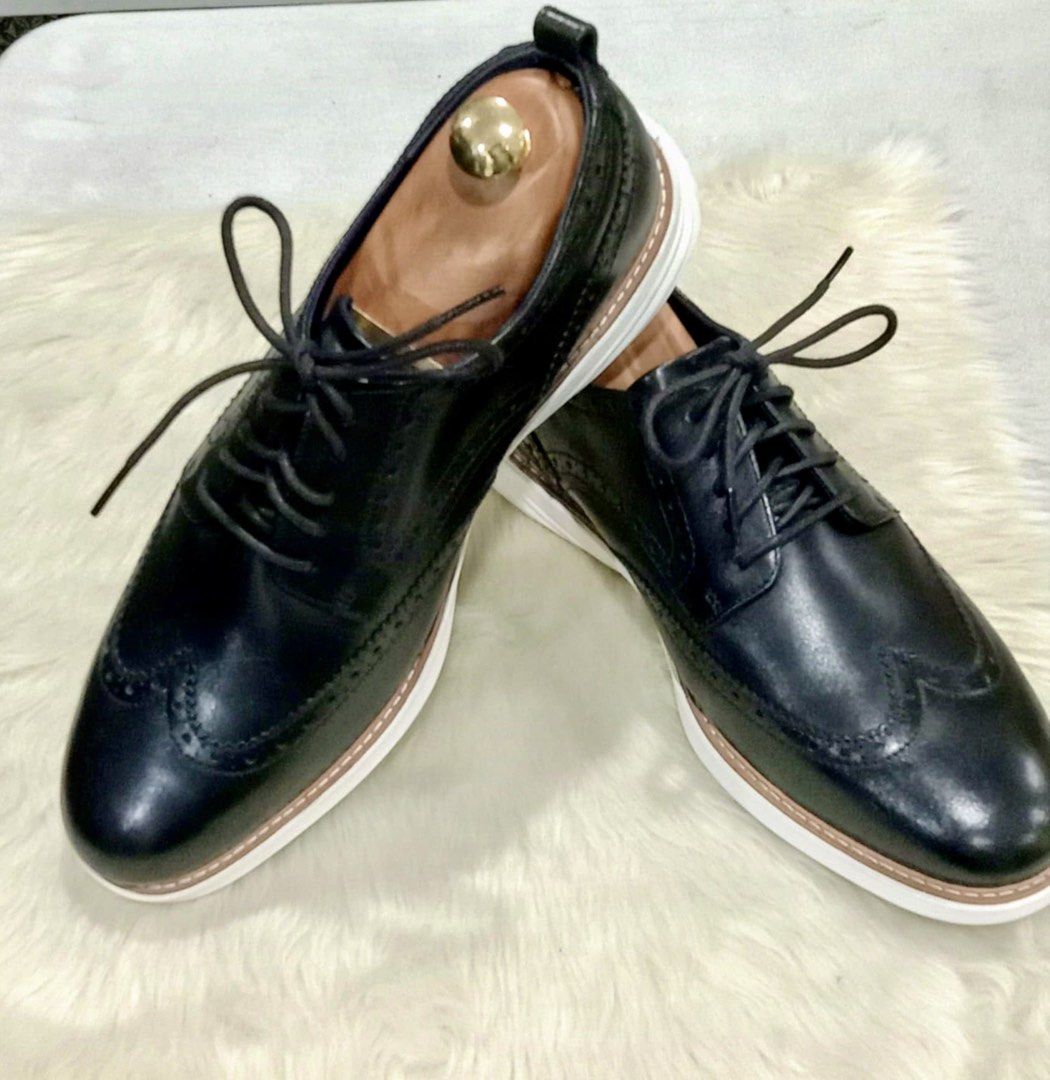 Cole Haan Grand Evolution Wingtip Oxford in Black Leather (Category: Casual Shoes) located in Paranaque City. Submitted by sole2squeeze (Listing ID 1451366162, Image 2). Description: - Classic black leather wingtip oxfords - Comfortable and grippy white rubber sole - Excludes wooden shoe trees - Versatile for smart casual and formal occasions - Well-maintained condition - Size 11W.