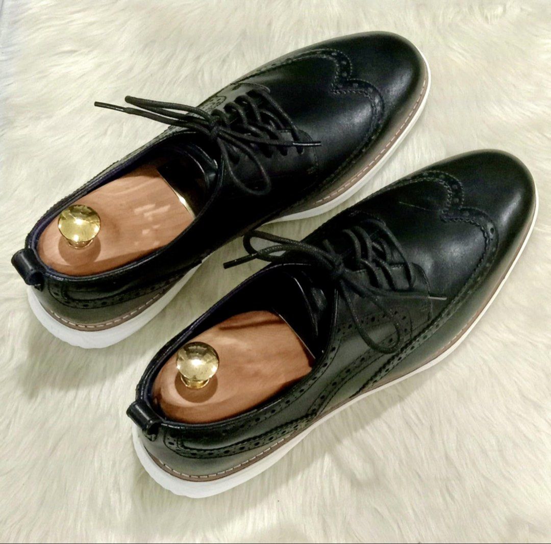 Cole Haan Grand Evolution Wingtip Oxford in Black Leather (Category: Casual Shoes) located in Paranaque City. Submitted by sole2squeeze (Listing ID 1451366162, Image 3). Description: - Classic black leather wingtip oxfords - Comfortable and grippy white rubber sole - Excludes wooden shoe trees - Versatile for smart casual and formal occasions - Well-maintained condition - Size 11W.
