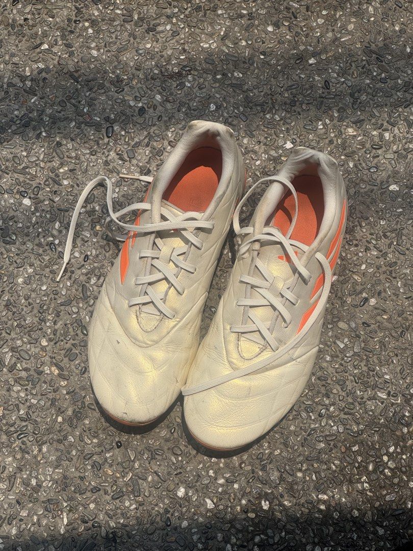 Copa Pure.3 "Football Boots" (Category: Sneakers) located in Manila. Submitted by galvanilui95151 (Listing ID 1451465037, Image 2). Description: - Adidas Copa soccer cleats - White and orange colorway - Suitable for firm ground (FG) - Shows some signs of wear, but plenty of life left - Ready for your next game - Great addition to your soccer gear collection.
